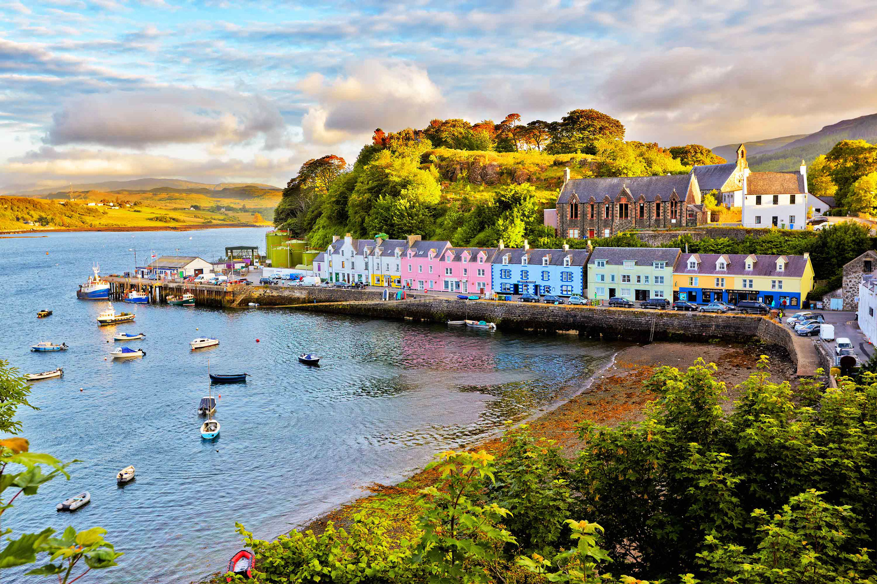 Enjoy the stunning scenery of Portree on a tour with Skye Taxi Tours private hire taxi